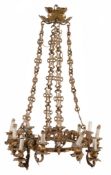 A Continental gilt metal twelve light chandelier, late 19th century  A Continental gilt metal twelve