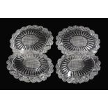 A set of four cut-glass oval dishes, second quarter 19th century  A set of four cut-glass oval