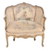 A giltwood and tapestry upholstered armchair in the Louis XV style  A giltwood and tapestry