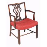 A mahogany armchair, in George III style, late 19th/20th century, the moulded rectangular back