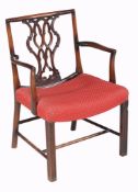 A mahogany armchair, in George III style, late 19th/20th century, the moulded rectangular back