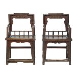 A pair of Chinese elm armchairs, 19th century  A pair of Chinese elm armchairs,   19th century, each