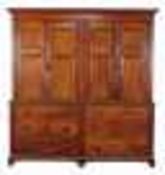 A Victorian pitch pine housekeepers cupboard, second half 19th century, the moulded cornice above