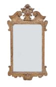 A George II carved giltwood wall mirror , circa 1735  A George II carved giltwood wall mirror  ,