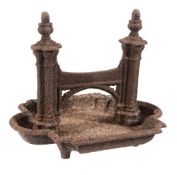 A cast iron bootscrape in Gothic style, second quarter 19th century  A cast iron bootscrape in