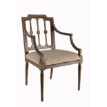 A George III painted beech elbow chair , circa 1790, of Sheraton design  A George III painted