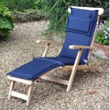 A hardwood 'steamer' chair, of recent manufacture, complete with loose cushion  A hardwood 'steamer'