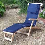 A hardwood 'steamer' chair, of recent manufacture, complete with loose cushion  A hardwood 'steamer'