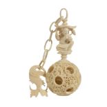 A Chinese ivory puzzle ball, late 19th/early 20th century  A Chinese ivory puzzle ball, late 19th/