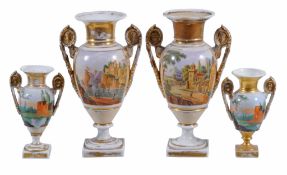 A pair of Paris porcelain vases , circa 1840, set with gilt mask handles  A pair of Paris