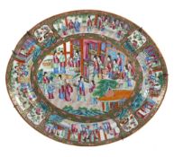 A large Cantonese oval dish, mid 19th century  A large Cantonese oval dish, mid 19th century,