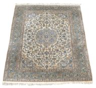 A large Persian carpet with floral border and floral field 350cm x 250cm  A large Persian carpet