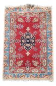 A Kazak rug and a Tabriz rug 155cm x 80cm, 142cm x 206cm A Kazak rug and a Tabriz rug 155cm x