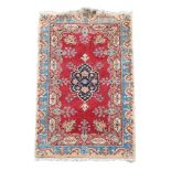 A Kazak rug and a Tabriz rug 155cm x 80cm, 142cm x 206cm A Kazak rug and a Tabriz rug 155cm x