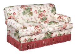 An upholstered sofa , 20th century, covered in Colefax & Fowler floral fabric  An upholstered