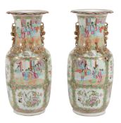 A pair of Cantonese vases, circa 1880, painted with panels of figures and...  A pair of Cantonese