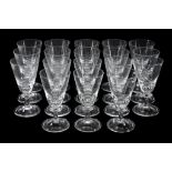 A set of eighteen modern wine goblets in the English early 18th century style  A set of eighteen