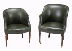 Two similar leather upholstered tub chairs in early 19th century style  Two similar leather