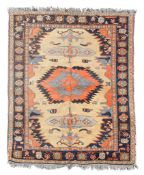 A Caucasian carpet , approximately 163cm x 233cm  A Caucasian carpet  , approximately 163cm x 233cm