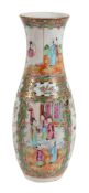A Cantonese vase, late 19th century, painted with panels of figures, 31cm high  A Cantonese vase,