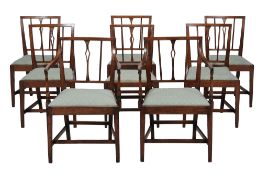 A set of eight mahogany dining chairs in Hepplewhite taste  A set of eight mahogany dining chairs in