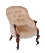 A Victorian mahogany and button upholstered armchair , circa 1870  A Victorian mahogany and button