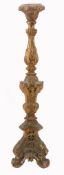 An Italian carved and giltwood altar candlestick, early 18th century  An Italian carved and giltwood