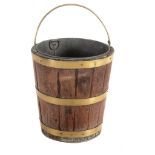 A mahogany and brass bound bucket , circa 1800 and later  A mahogany and brass bound bucket ,