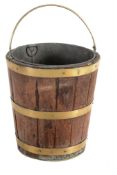 A mahogany and brass bound bucket , circa 1800 and later  A mahogany and brass bound bucket ,