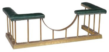A brass and leather upholstered club fender , 20th century  A brass and leather upholstered club
