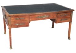 A French mahogany and gilt metal mounted desk , in Empire style  A French mahogany and gilt metal