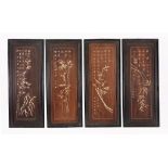 A set of four ivory inlaid hardwood panels, with bamboo and calligraphy  A set of four ivory