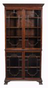 A Victorian glazed bookcase , circa 1860, the base stamped HOLLAND & SONS LTD  A Victorian glazed