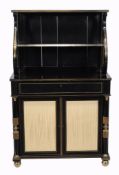 A late Regency ebony and brass inlaid secretaire chiffonnier, circa 1820  A late Regency ebony and