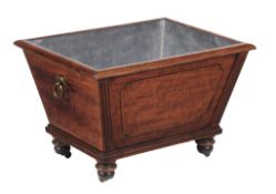 A Regency mahogany wine cooler, circa 1815, of tapering form  A Regency mahogany wine cooler,