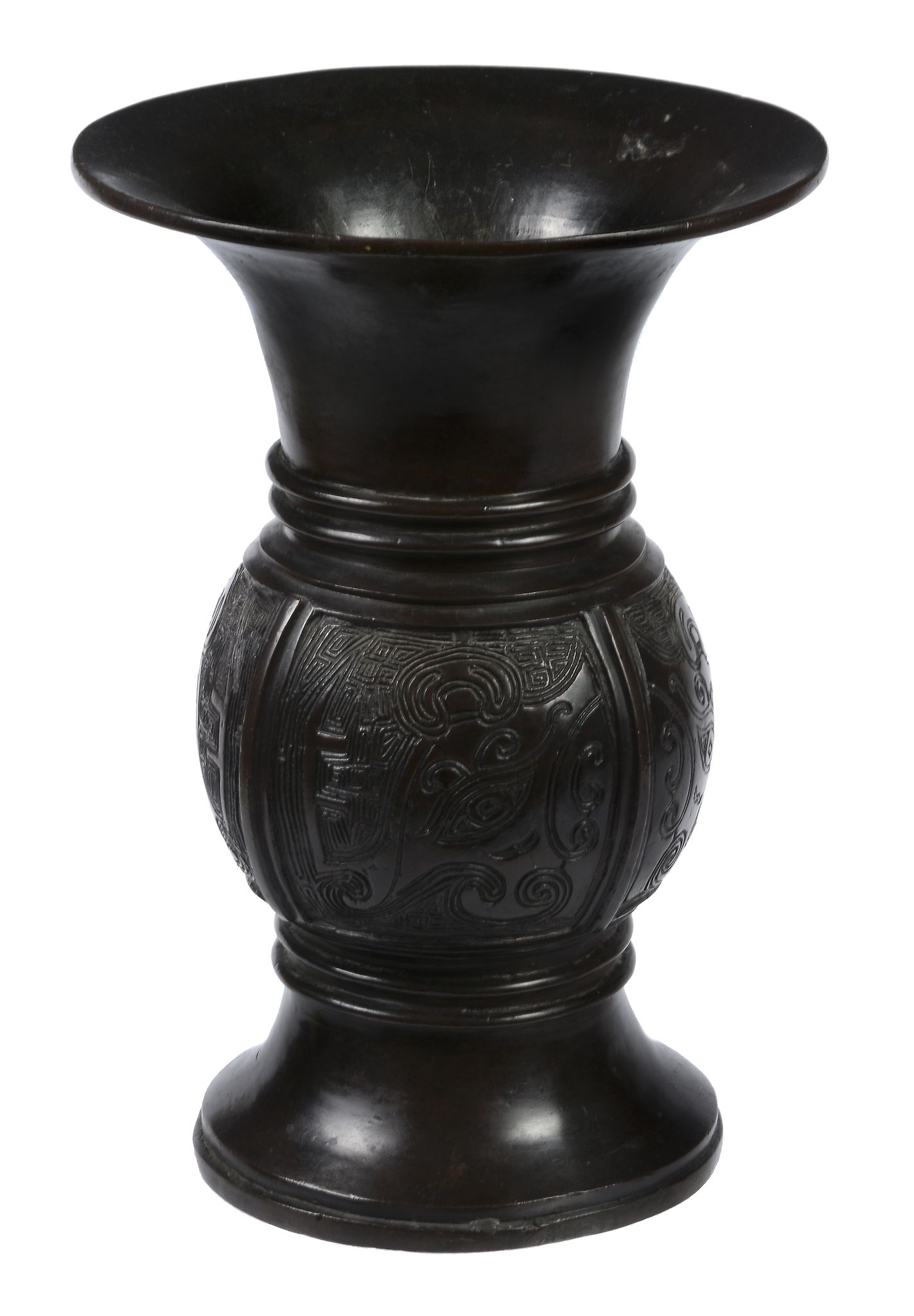 An archaistic bronze zun vessel, the ovid body with four flanges on flared...  An archaistic bronze