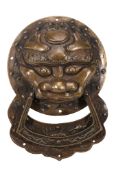 A Chinese bronze door knocker, Qing Dynasty, 19th century  A Chinese bronze door knocker, Qing