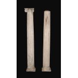 A pair of painted architectural columns , each with Ionic capital above a...  A pair of painted
