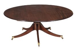 A circular mahogany dining table , 20th century  A circular mahogany dining table  , 20th century,