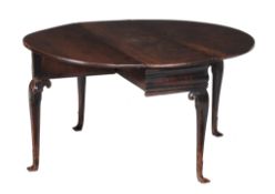 An oak drop leaf table , first quarter 18th century  An oak drop leaf table  , first quarter 18th