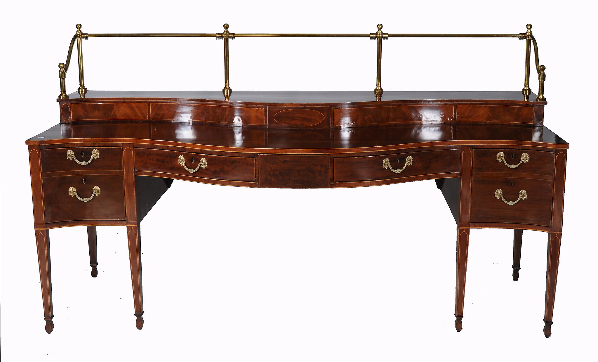 A George III mahogany serpentine sideboard, circa 1800, with string inlay  A George III mahogany