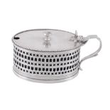 A late Victorian silver oval mustard by Charles Stuart Harris, London 1895  A late Victorian