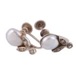 A pair of pearl and diamond earrings, the pearl with an eight cut diamond...  A pair of pearl and