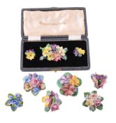 A Royal Crown Derby brooch and pair of ear clips  A Royal Crown Derby brooch and pair of ear clips,