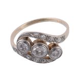 A diamond ring, set with three old brilliant cut diamond collet set within a...  A diamond ring,