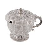 A silver shaped circular pedestal mustard by Goldsmiths & Silversmiths Co. Ltd  A silver shaped