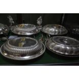 A collection of electroplate, including: entree dishes, covers and handles; a tankard; various mugs;