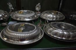 A collection of electroplate, including: entree dishes, covers and handles; a tankard; various mugs;