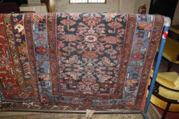 A Middle Eastern corridor rug , blue and pink stylised flowers and birds, two further Middle Eastern
