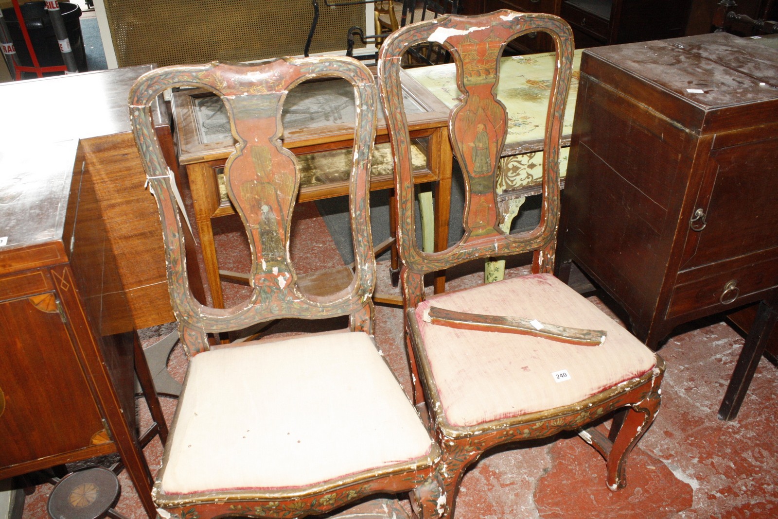 A pair of mid 19th Century English Oriental style red lacquered chairs